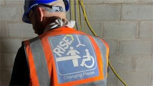 Image of builder in preparing Changing Places For Blackburn Rovers Football Club