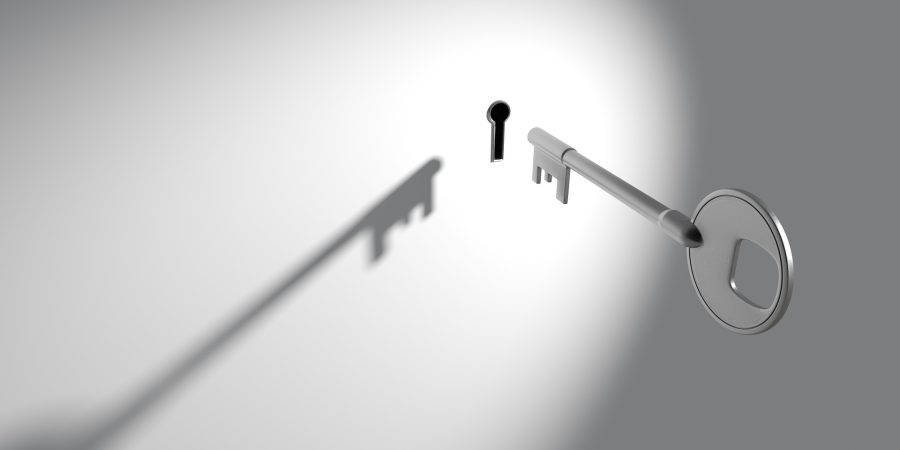 image shows a key going into a lock to demonstate a blog about changing places toilet door access
